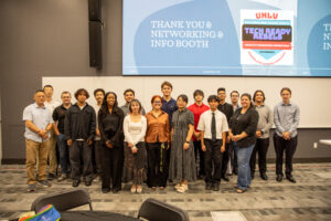 Students in the IT Workforce Talent Pipeline program pose for a picture at their commencement ceremony on Saturday, Aug. 17, 2024, at UNLV's College of Engineering Advanced Engineering Building.